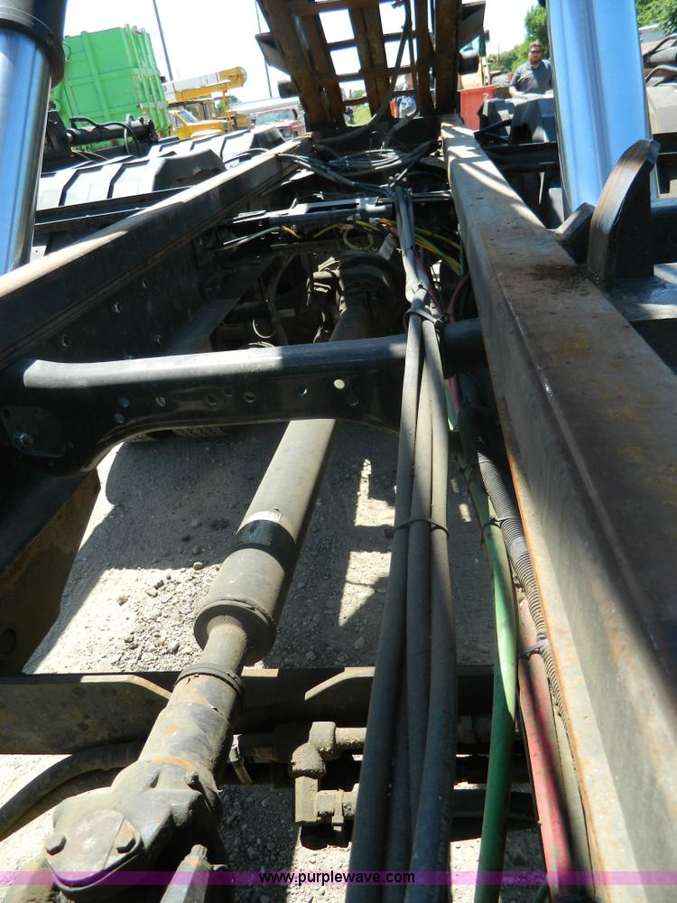 image for item J8899 2007 Freightliner Business Class M2 roll off truck