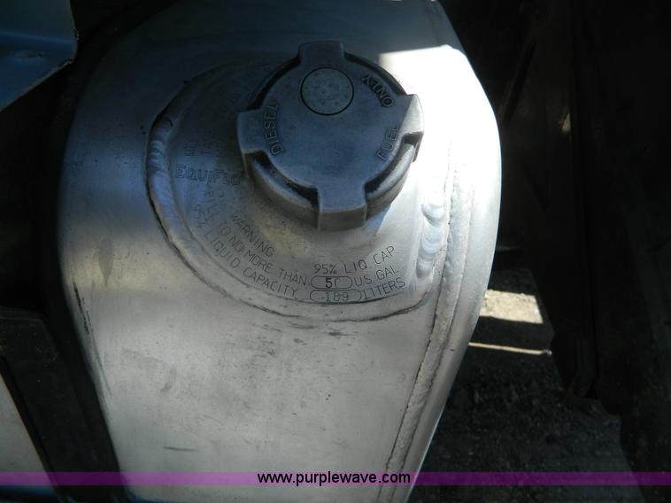 image for item J8899 2007 Freightliner Business Class M2 roll off truck