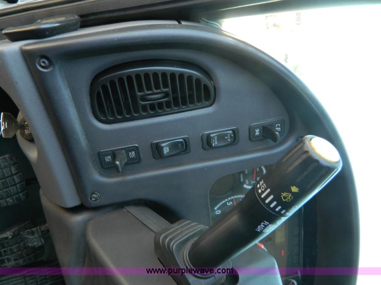 image for item J8899 2007 Freightliner Business Class M2 roll off truck