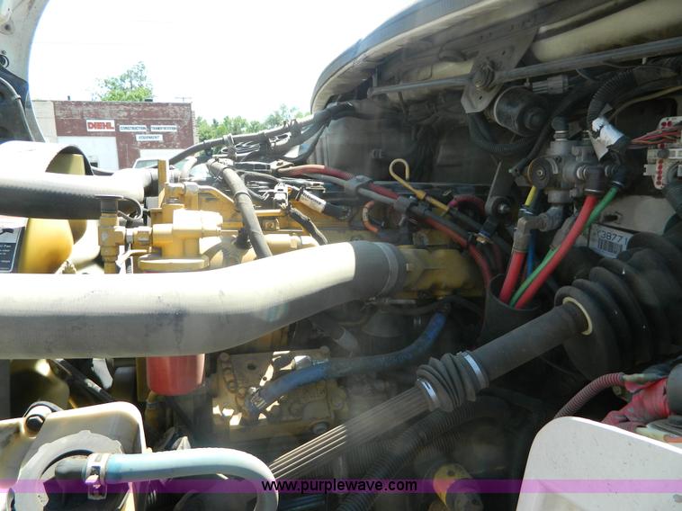 image for item J8899 2007 Freightliner Business Class M2 roll off truck