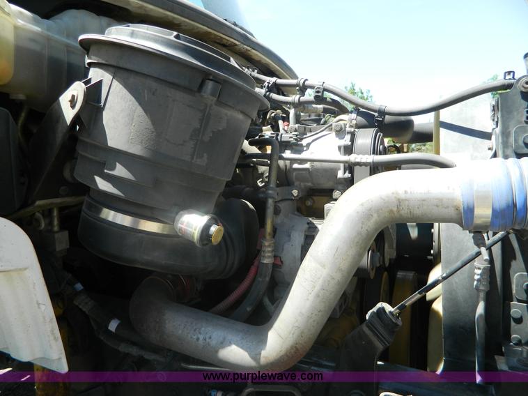 image for item J8899 2007 Freightliner Business Class M2 roll off truck