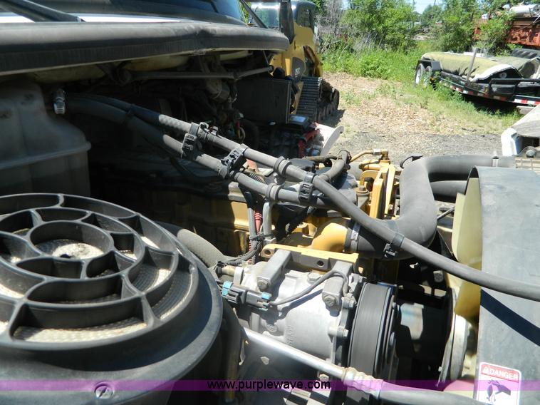 image for item J8899 2007 Freightliner Business Class M2 roll off truck