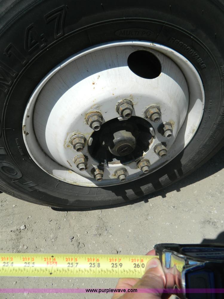 image for item J8899 2007 Freightliner Business Class M2 roll off truck