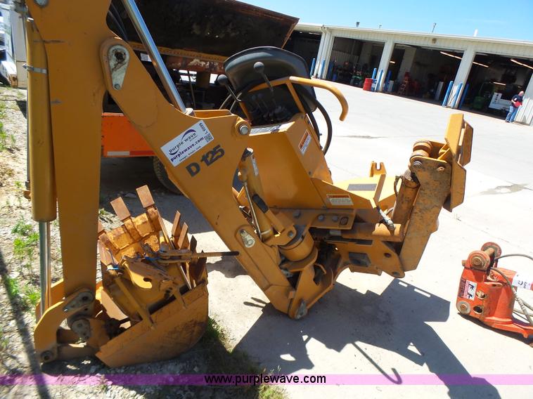 image for item L6099 Case D125 skid steer backhoe attachment