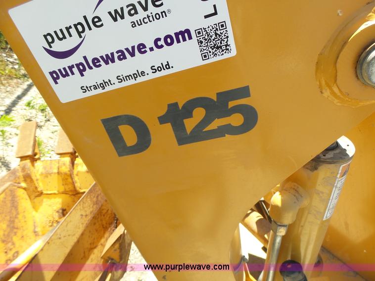 image for item L6099 Case D125 skid steer backhoe attachment