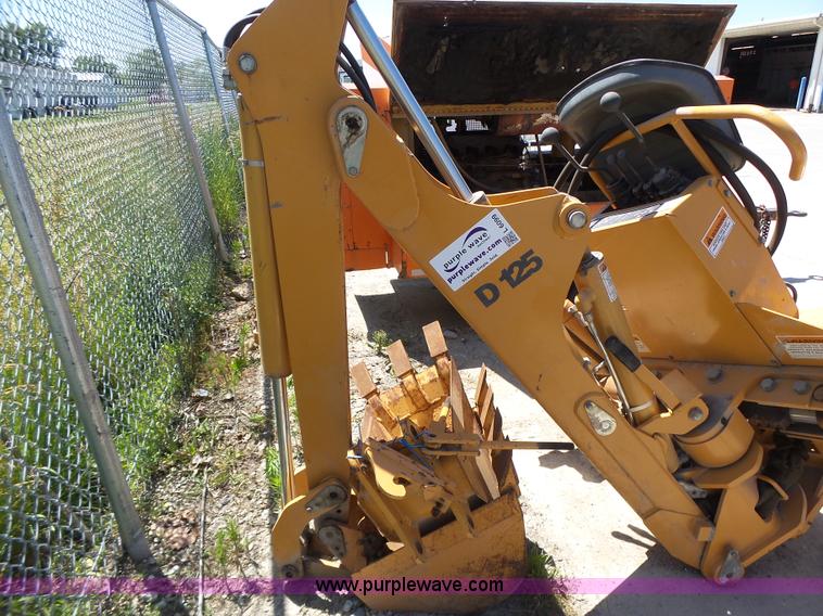 image for item L6099 Case D125 skid steer backhoe attachment