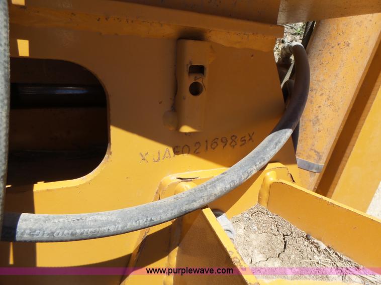 image for item L6099 Case D125 skid steer backhoe attachment
