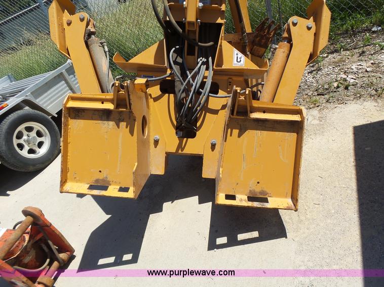 image for item L6099 Case D125 skid steer backhoe attachment
