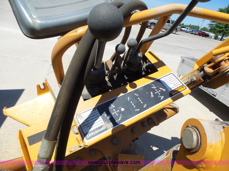 image for item L6099 Case D125 skid steer backhoe attachment