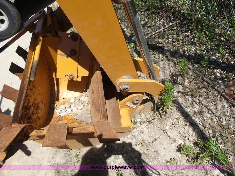 image for item L6099 Case D125 skid steer backhoe attachment