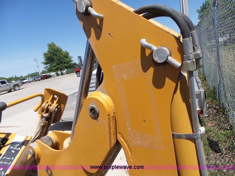 image for item L6099 Case D125 skid steer backhoe attachment