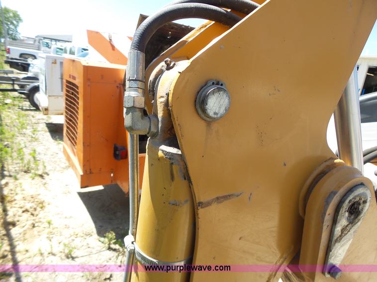 image for item L6099 Case D125 skid steer backhoe attachment