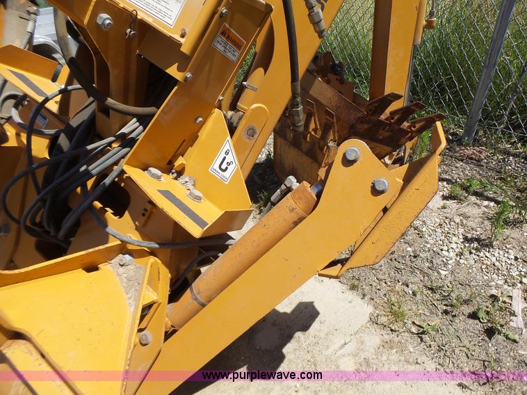 image for item L6099 Case D125 skid steer backhoe attachment