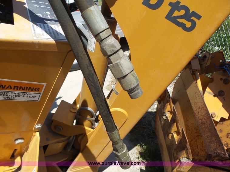 image for item L6099 Case D125 skid steer backhoe attachment