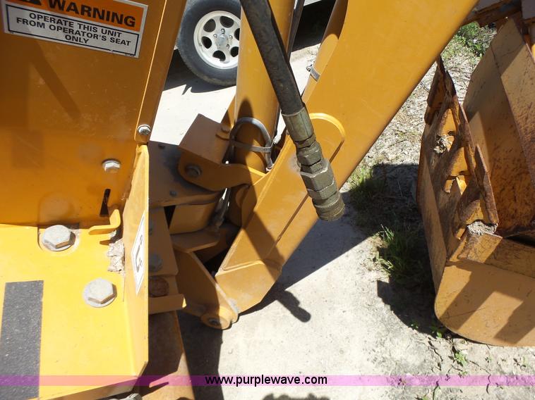 image for item L6099 Case D125 skid steer backhoe attachment