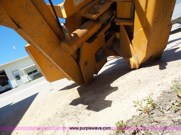 image for item L6099 Case D125 skid steer backhoe attachment