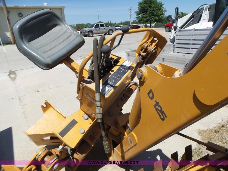 image for item L6099 Case D125 skid steer backhoe attachment