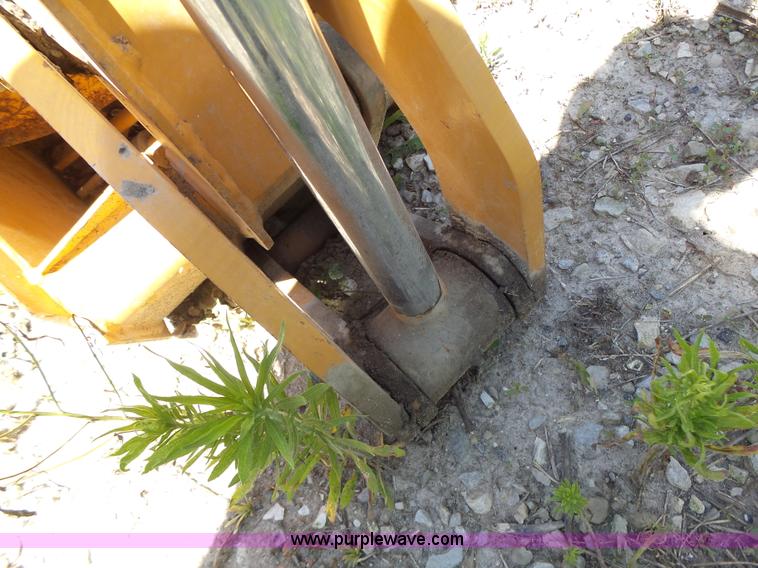 image for item L6099 Case D125 skid steer backhoe attachment