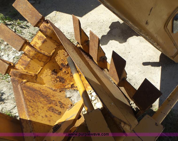 image for item L6099 Case D125 skid steer backhoe attachment