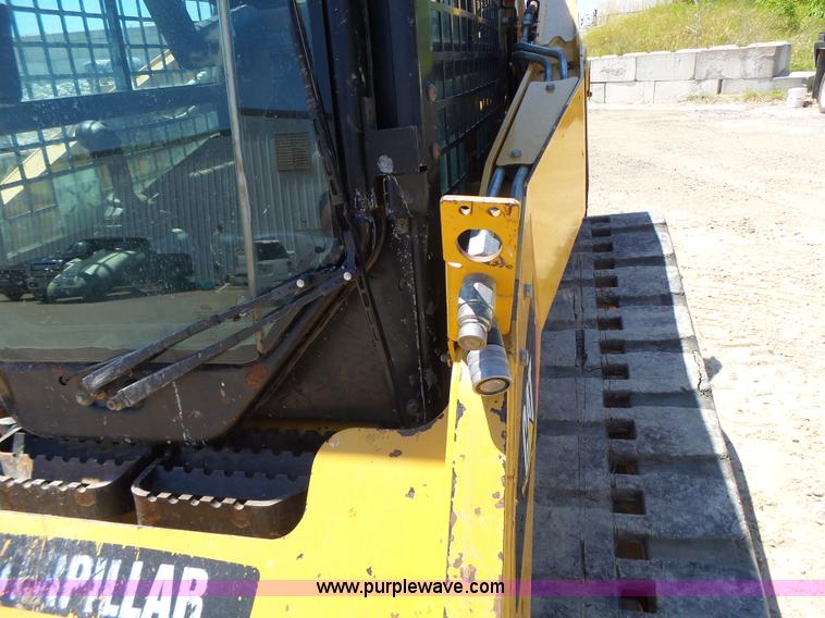 image for item L6110 2012 Caterpillar 259B Series 3 skid steer