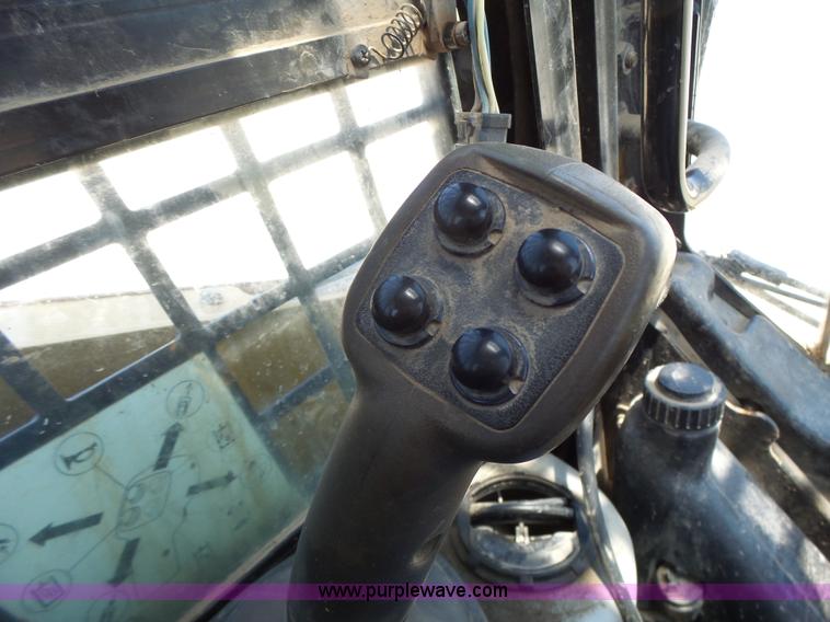 image for item L6110 2012 Caterpillar 259B Series 3 skid steer