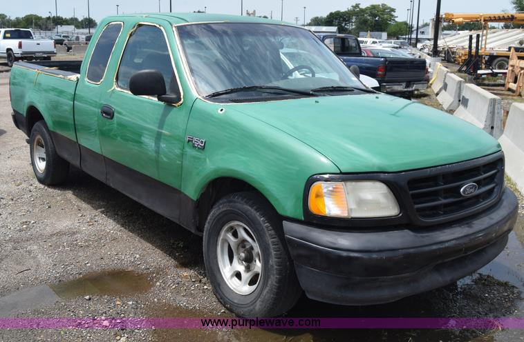 image for item CB9302 1998 Ford F150 SuperCab pickup truck