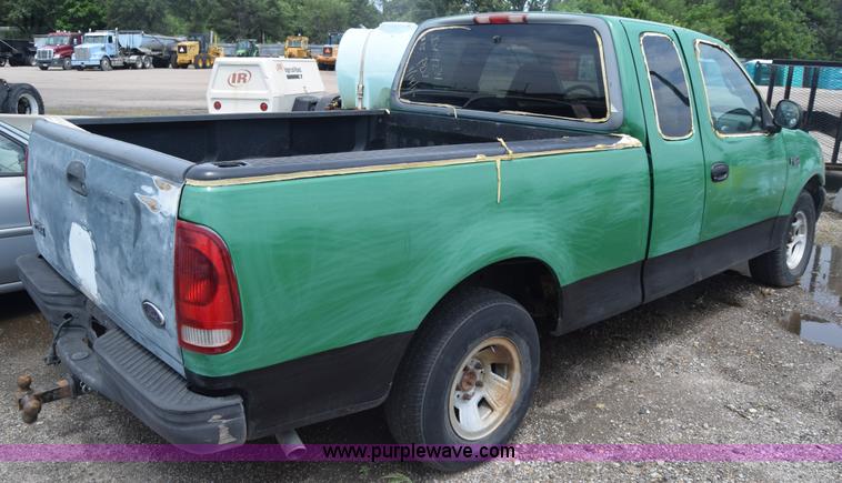 image for item CB9302 1998 Ford F150 SuperCab pickup truck