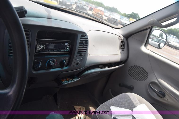 image for item CB9302 1998 Ford F150 SuperCab pickup truck