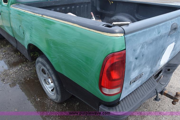 image for item CB9302 1998 Ford F150 SuperCab pickup truck