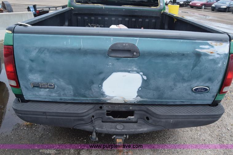 image for item CB9302 1998 Ford F150 SuperCab pickup truck