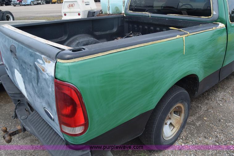 image for item CB9302 1998 Ford F150 SuperCab pickup truck