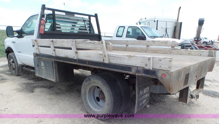 image for item CC9865 2005 Ford F350 flatbed pickup truck