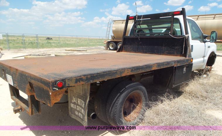 image for item CC9868 2007 Ford F350 Super Duty flatbed pickup truck