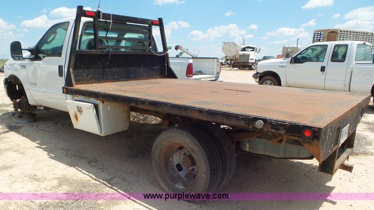 image for item CC9868 2007 Ford F350 Super Duty flatbed pickup truck