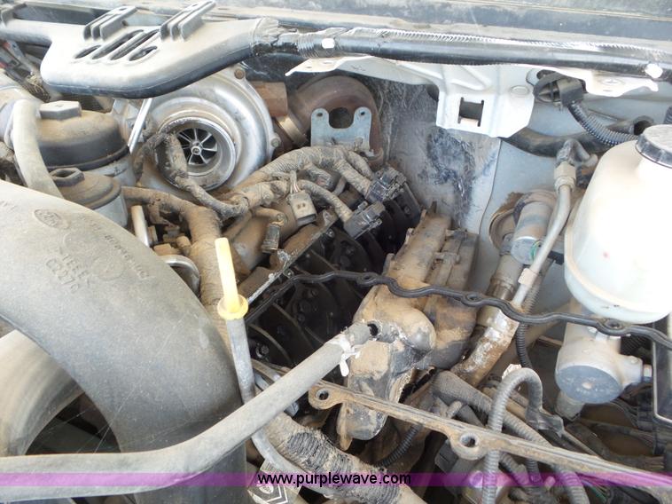 image for item CC9868 2007 Ford F350 Super Duty flatbed pickup truck