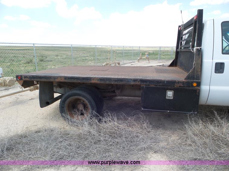 image for item CC9868 2007 Ford F350 Super Duty flatbed pickup truck