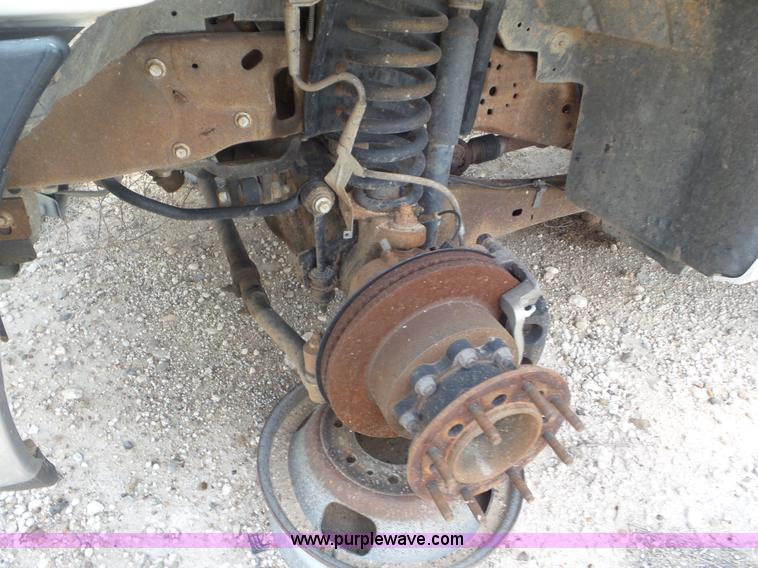 image for item CC9868 2007 Ford F350 Super Duty flatbed pickup truck