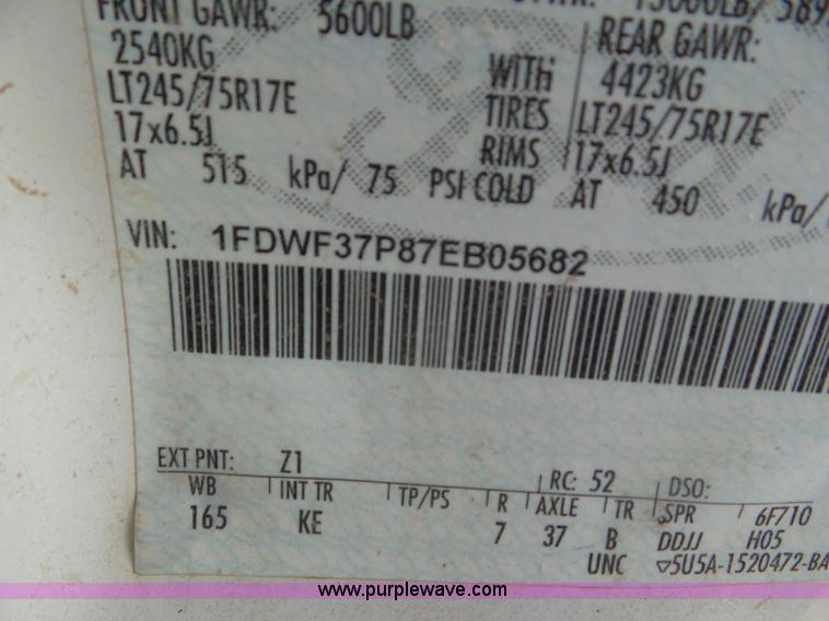 image for item CC9868 2007 Ford F350 Super Duty flatbed pickup truck