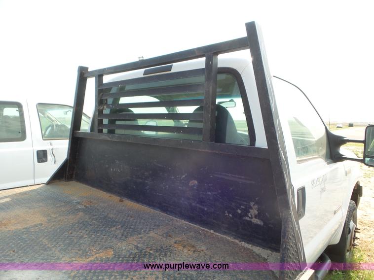 image for item CC9885 2005 Ford F350 flatbed pickup truck