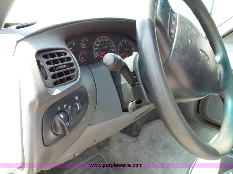 image for item J4898 1997 Ford F150 XLT flatbed pickup truck