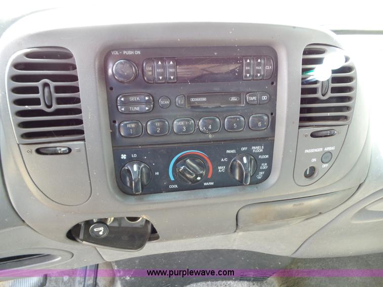 image for item J4898 1997 Ford F150 XLT flatbed pickup truck