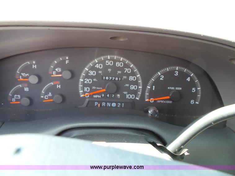 image for item J4898 1997 Ford F150 XLT flatbed pickup truck