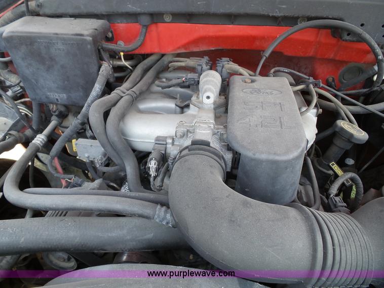 image for item J4898 1997 Ford F150 XLT flatbed pickup truck