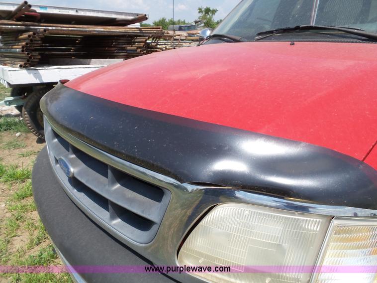 image for item J4898 1997 Ford F150 XLT flatbed pickup truck