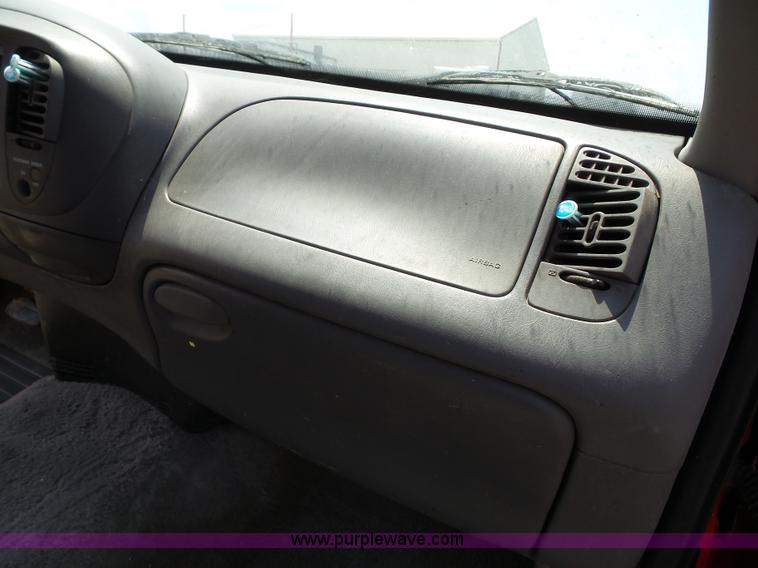 image for item J4898 1997 Ford F150 XLT flatbed pickup truck