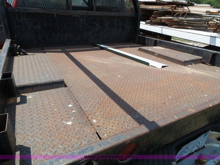 image for item J4898 1997 Ford F150 XLT flatbed pickup truck