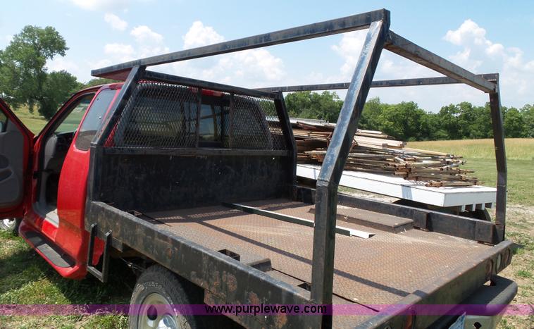 image for item J4898 1997 Ford F150 XLT flatbed pickup truck