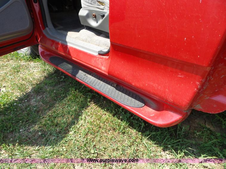 image for item J4898 1997 Ford F150 XLT flatbed pickup truck