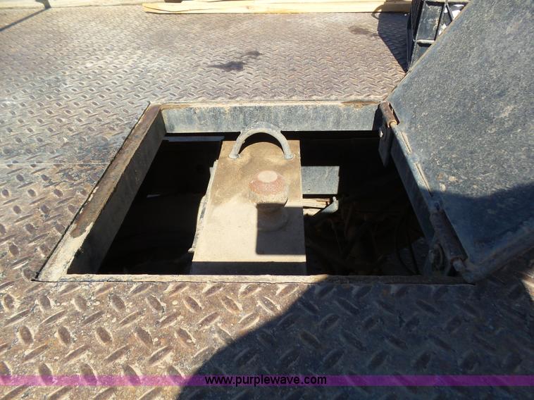 image for item J6042 2004 Dodge Ram 2500 Quad Cab flatbed pickup truck