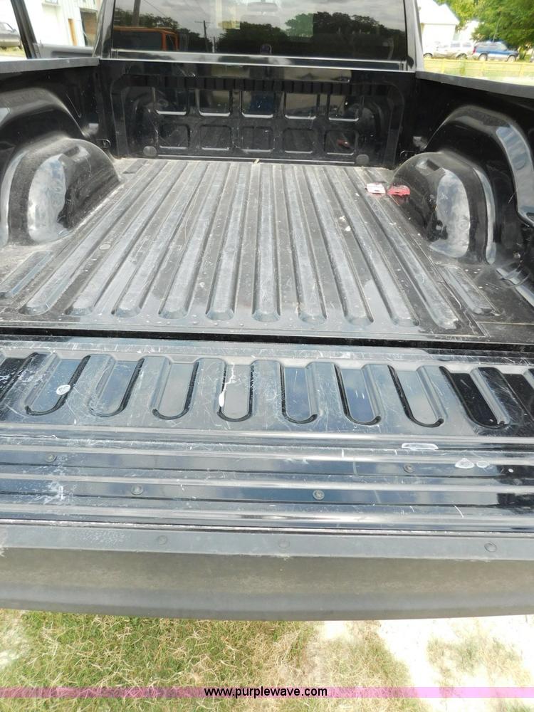 image for item J7298 2012 Dodge Ram 1500 Quad Cab pickup truck